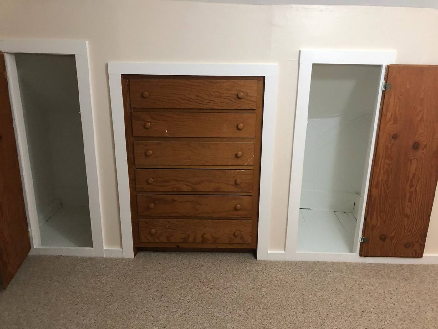 Closet doors and trim in an attic room