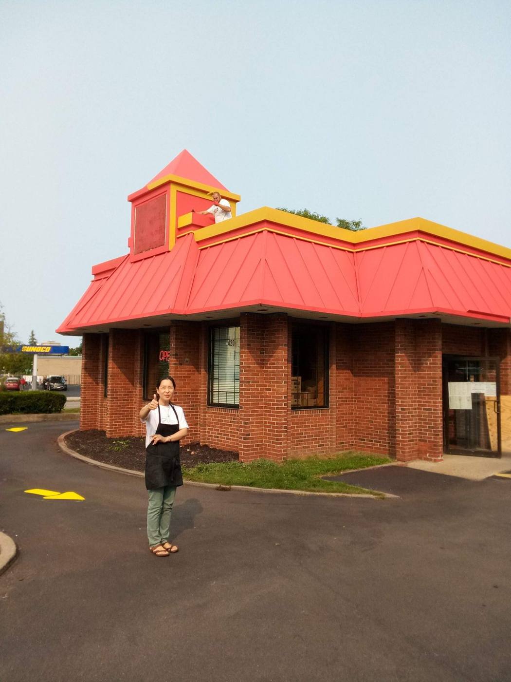 Lin's Garden after: bright red roof with yellow trim